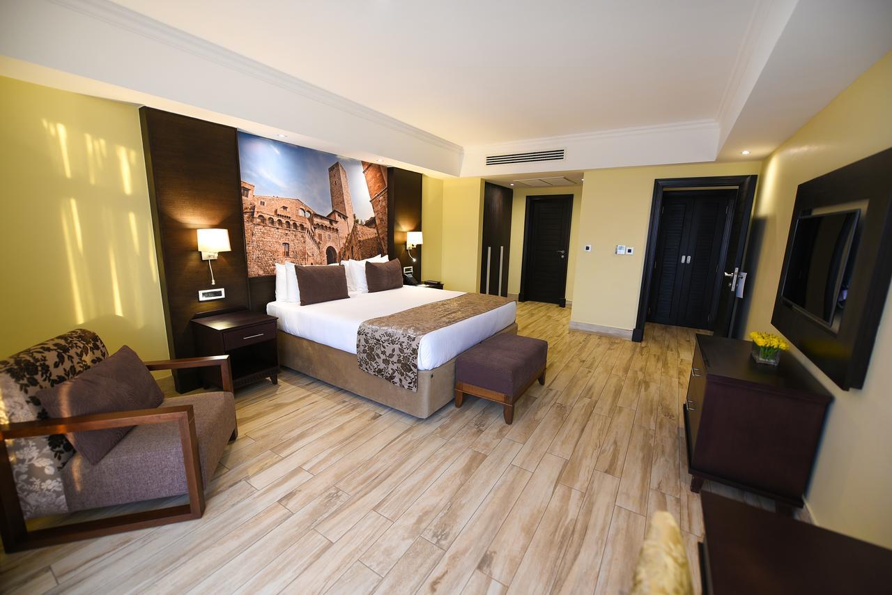 Mestil Hotel & Residences Кампала Экстерьер фото
