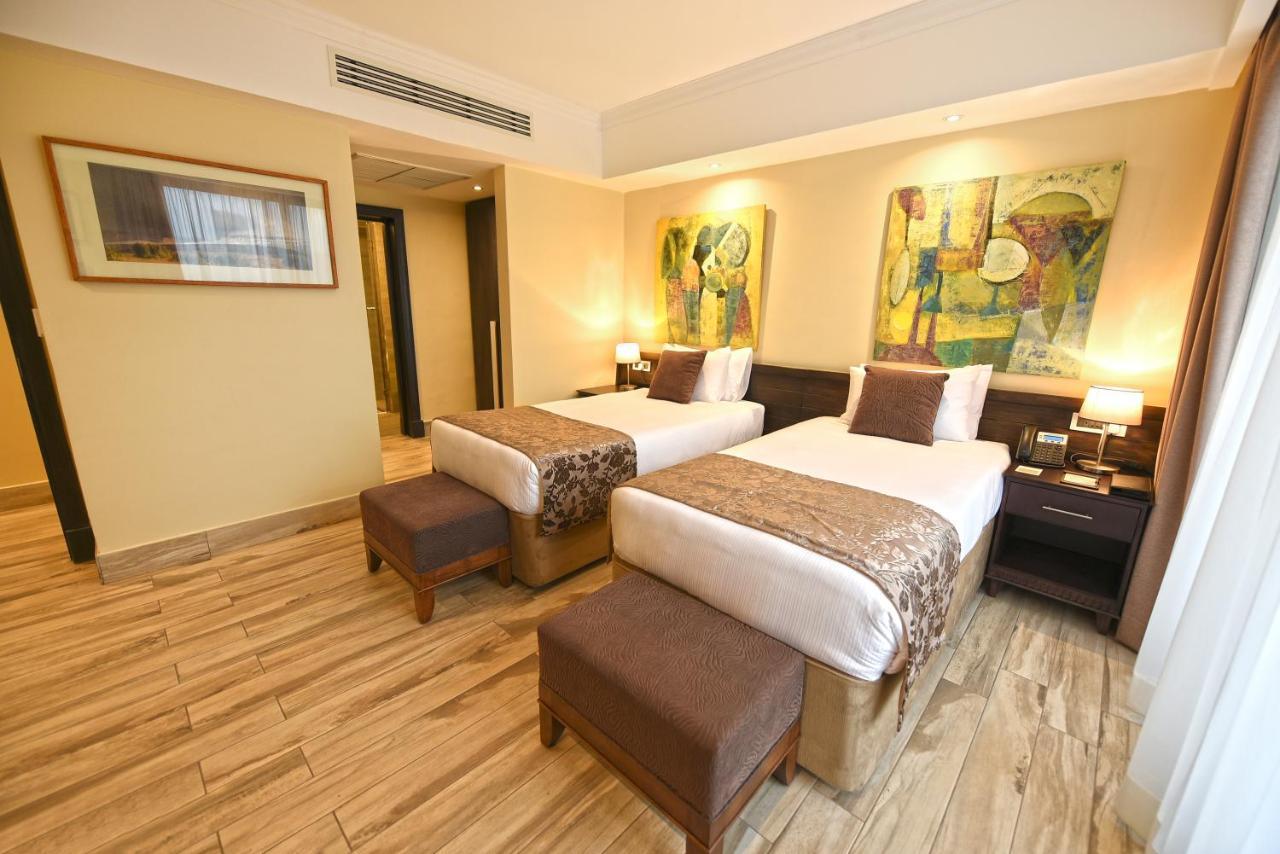 Mestil Hotel & Residences Кампала Экстерьер фото