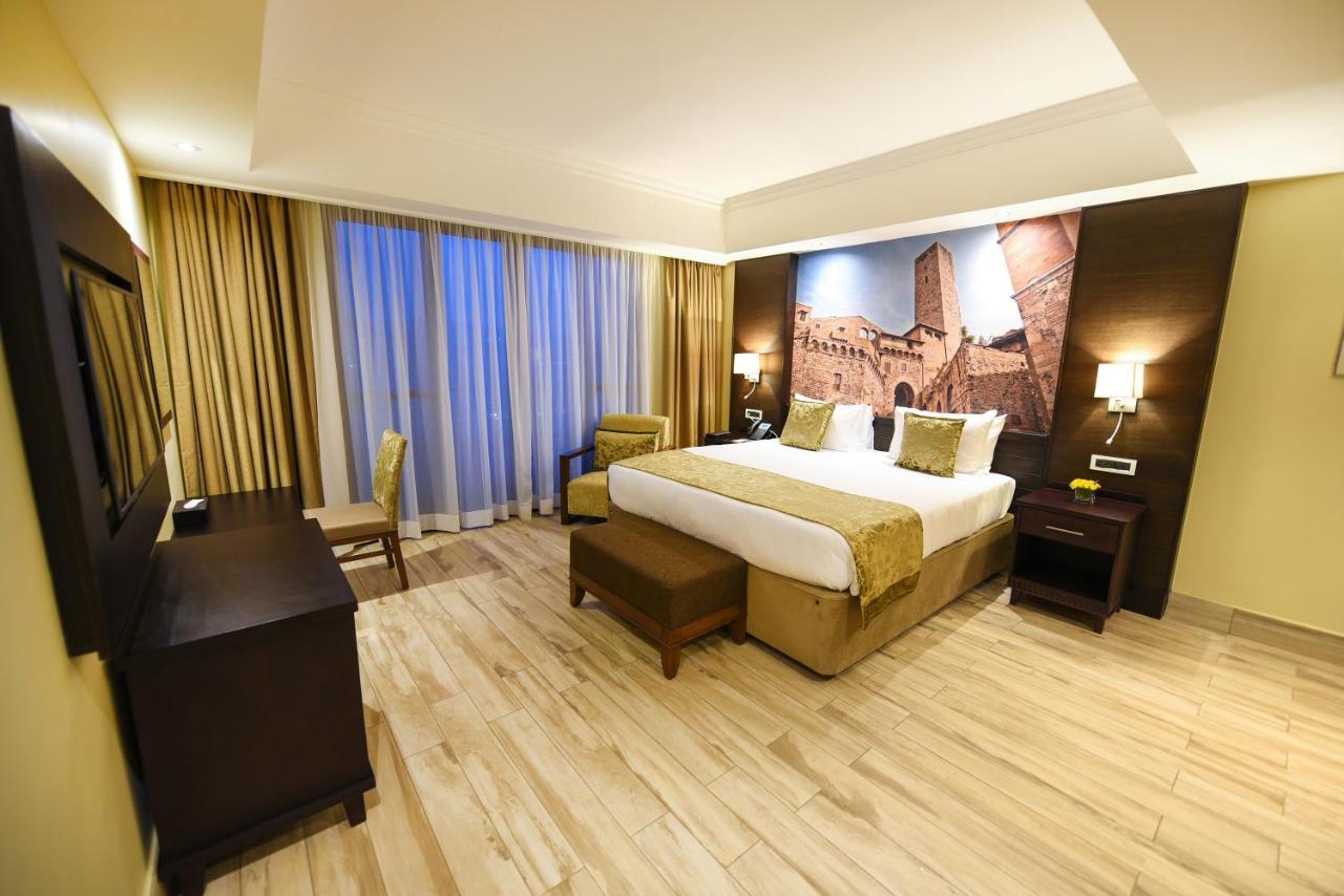 Mestil Hotel & Residences Кампала Экстерьер фото